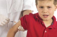 Boy getting vaccinated