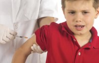 Boy getting vaccinated