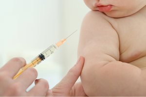 Syringe and baby