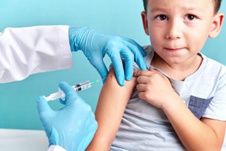 boy being vaccinated